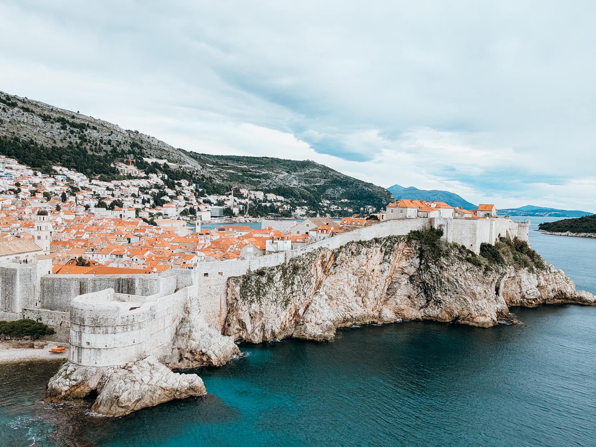 Best Day Trips from Dubrovnik Windmill with stream and tulip field in the background